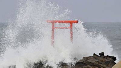 Typhoon Ampil moves away from Japan as train services resume and no major damage is reported - apnews.com - Japan - prefecture Fukushima - prefecture Tochigi - city Tokyo