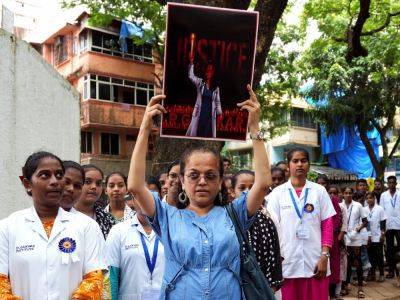 Narendra Modi - Some doctors still on strike, protests spread after Indian medic’s murder - aljazeera.com - India - Britain - state Bengal - city Delhi - city Kolkata