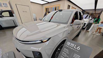 Evelyn Cheng - July - Ev - Li Auto's July deliveries hit a record as Chinese EV consumers prefer hybrid options - cnbc.com - China - city Beijing