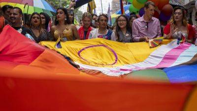 BINAJ GURUBACHARYA - Same-sex couples and LGBTQ+ activists rally in Nepal’s capital during the annual Pride parade - apnews.com - Nepal - city Kathmandu, Nepal