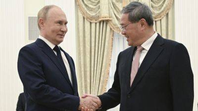 Xi Jinping - Vladimir Putin - Putin meets China’s No. 2 as Moscow-Beijing relations deepen - apnews.com - China - Russia - Ukraine - city Moscow - city Beijing, China - city Kursk