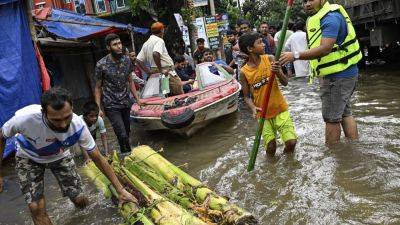 JULHAS ALAM - As more floods batter Bangladesh and India, death toll rises to 30 - apnews.com - India - Bangladesh - city Dhaka, Bangladesh - state Tripura