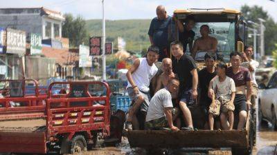 Heavy rainstorms killed 11 people and left 14 others missing in northeastern Chinese city - apnews.com - China - city Beijing