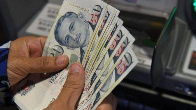 Bloomberg - Singapore’s currency scales new heights as traders bet on diverging policy paths - scmp.com - Usa - Singapore - city Singapore