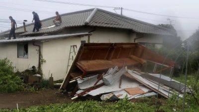 Helen Regan - Japan urges 1 million to evacuate as lumbering Typhoon Shanshan threatens south with up to a meter of rain - edition.cnn.com - Japan - prefecture Kagoshima