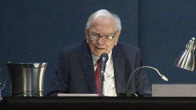 Warren Buffett's Berkshire Hathaway sold nearly half its stake in Apple