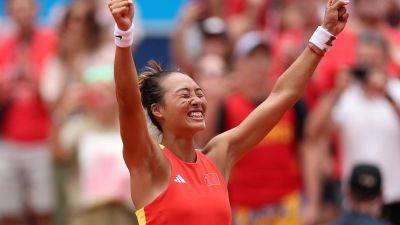 Zheng Qinwen summons inner strength to claim China’s first Olympic singles gold medal with victory against Donna Vekić
