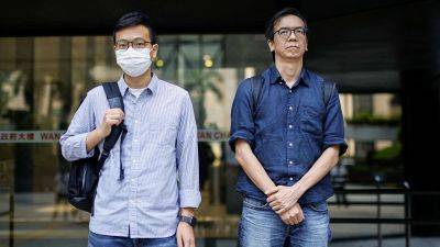 Chris Lau - Hong Kong journalists found guilty of sedition in case critics say highlights decline in press freedom - edition.cnn.com - China - Hong Kong - Britain - city Beijing - city Hong Kong, China