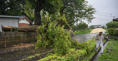 Tropical Storm Shanshan Soaks Japan, Raising Flood and Landslide Risks - nytimes.com - Japan - city Tokyo