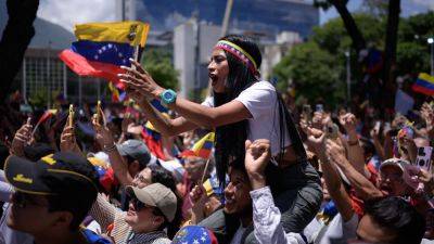 Nicolas Maduro - Edmundo Gonzalez - Venezuelans march over contested election, number of detained rises - cnbc.com - Usa - Venezuela - city Caracas