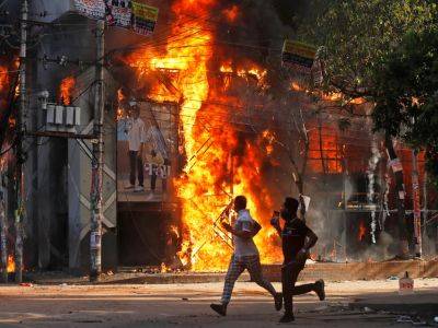 At least 30 killed as Bangladesh protesters renew call for Hasina to quit