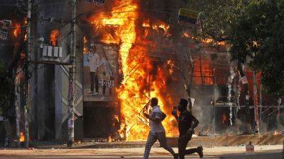 Prime Minister Sheikh Hasina resigns and leaves Bangladesh, ending 15-year rule