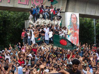 Photos: Celebrations after PM Sheikh Hasina resigns, flees Bangladesh