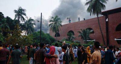 Crowds Swarm Prime Minister’s Residence after Bangladesh Leader Flees