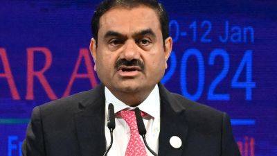 Charles - Business Insider - Gautam Adani, Asia’s second-richest man, finally has a succession plan for his company - scmp.com - Usa - India - Switzerland