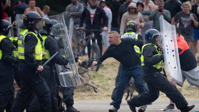 As riots and disorder spread, some countries warn their citizens about traveling to the UK