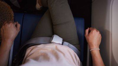 An airline now allows women to avoid sitting next to men. Here's how travelers are reacting