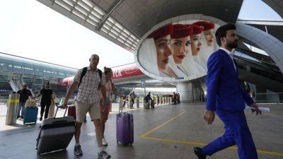 Associated Press - Dubai airport sets passenger record, thanks to Indian travellers, those transiting via China - scmp.com - China - Usa - India - Uae - city Dubai