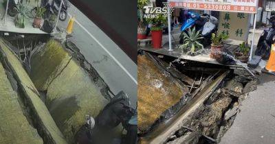 2 motorbikes fall in, water pipes damaged as sinkhole opens in Taiwan; no injuries reported