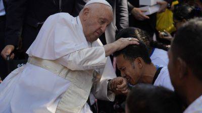 NINIEK KARMINI - John Paul II (Ii) - East Timorese flock to seaside park for Pope Francis’ Mass at site of John Paul II’s historic visit - apnews.com - Indonesia - Poland - Portugal - Timor-Leste - city Dili