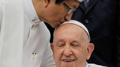 Pope Francis’ Singapore visit unites thousands for historic mass