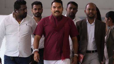 Sri Lankans - Gotabaya Rajapaksa - KRISHAN FRANCIS - Mahinda Rajapaksa - Namal Rajapaksa - Sri Lankans’ fury forced the powerful Rajapaksa clan out. Now its heir is running for president - apnews.com - Sri Lanka