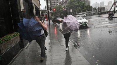 Shanghai slammed by what China says is the city’s strongest storm in seven decades