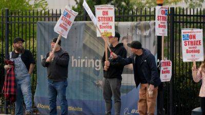 Boeing freezes hiring in sweeping cost cuts as it grapples with factory worker strike