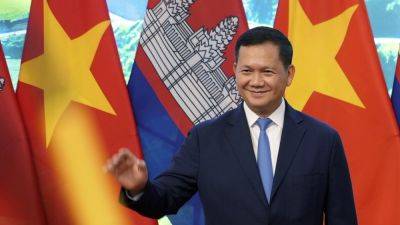 Cambodia pulls out of a regional development pact after protests