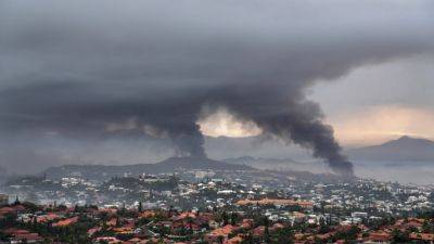 Emmanuel Macron - Paris Olympics - BARBARA SURK - France has a new government. Can it solve the New Caledonia crisis after months of deadly unrest? - apnews.com - France - Australia - New Caledonia