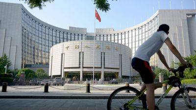 China central bank cuts medium-term loan rate