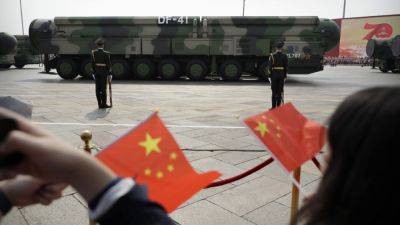 China test-fires an intercontinental ballistic missile into the Pacific Ocean