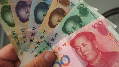 Chinese yuan hits strongest level against dollar in over 16 months as investors assess PBOC stimulus