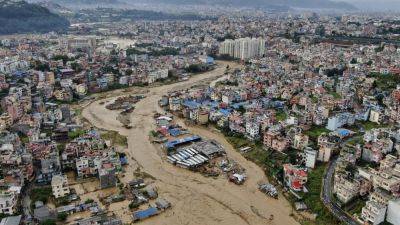 BINAJ GURUBACHARYA - Flooding and landslides in Nepal kill at least 66 people, with as many again still missing - apnews.com - Nepal - city Kathmandu, Nepal