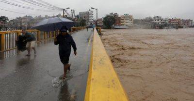 Nepal closes schools after heavy rains kill 100