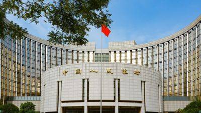 China's central bank tells commercial lenders to start cutting rates on existing mortgages