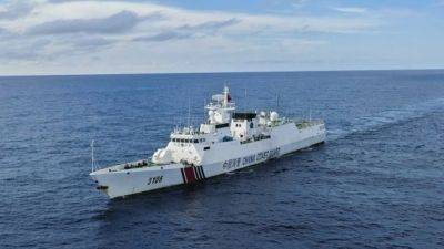 Scarborough Shoal ‘completely surrounded’ by Chinese ships, Filipino fishers say