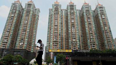 Reuters - Anniek Bao - China property stocks rally after major cities ease homebuying restrictions - cnbc.com - China - Hong Kong - city Beijing - city Shanghai - city Guangzhou