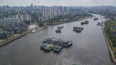 School and work are suspended in parts of southern China as Typhoon Yagi edges closer