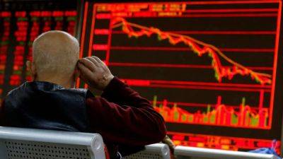 Chinese stocks advance on PBOC’s hint of easing, Hong Kong closed due to typhoon