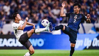 Xi Jinping - Chris Lau - China’s men soccer team faces fan backlash after humiliating loss to arch-rivals Japan - edition.cnn.com - Japan - China - Hong Kong - Monaco - city Tokyo