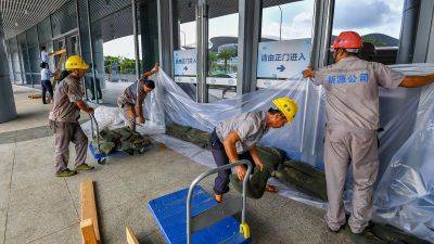 One of the year’s strongest typhoons slams into ‘China’s Hawaii’