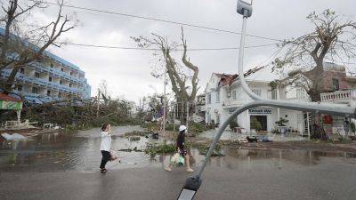 Quang Ninh - Typhoon Yagi kills 14 in Vietnam as officials warn of heavy rain that can cause flooding - apnews.com - China - Philippines - Vietnam - city Hanoi, Vietnam